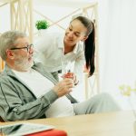 lady talking and caring for an eldering